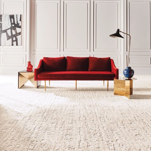 red sofa on a beige carpet floor from Roedigers Custom Flooring in Celina, OH